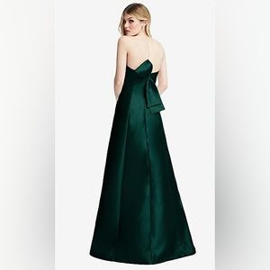 STRAPLESS A-LINE SATIN GOWN WITH MODERN BOW DETAIL IN EVERGREEN